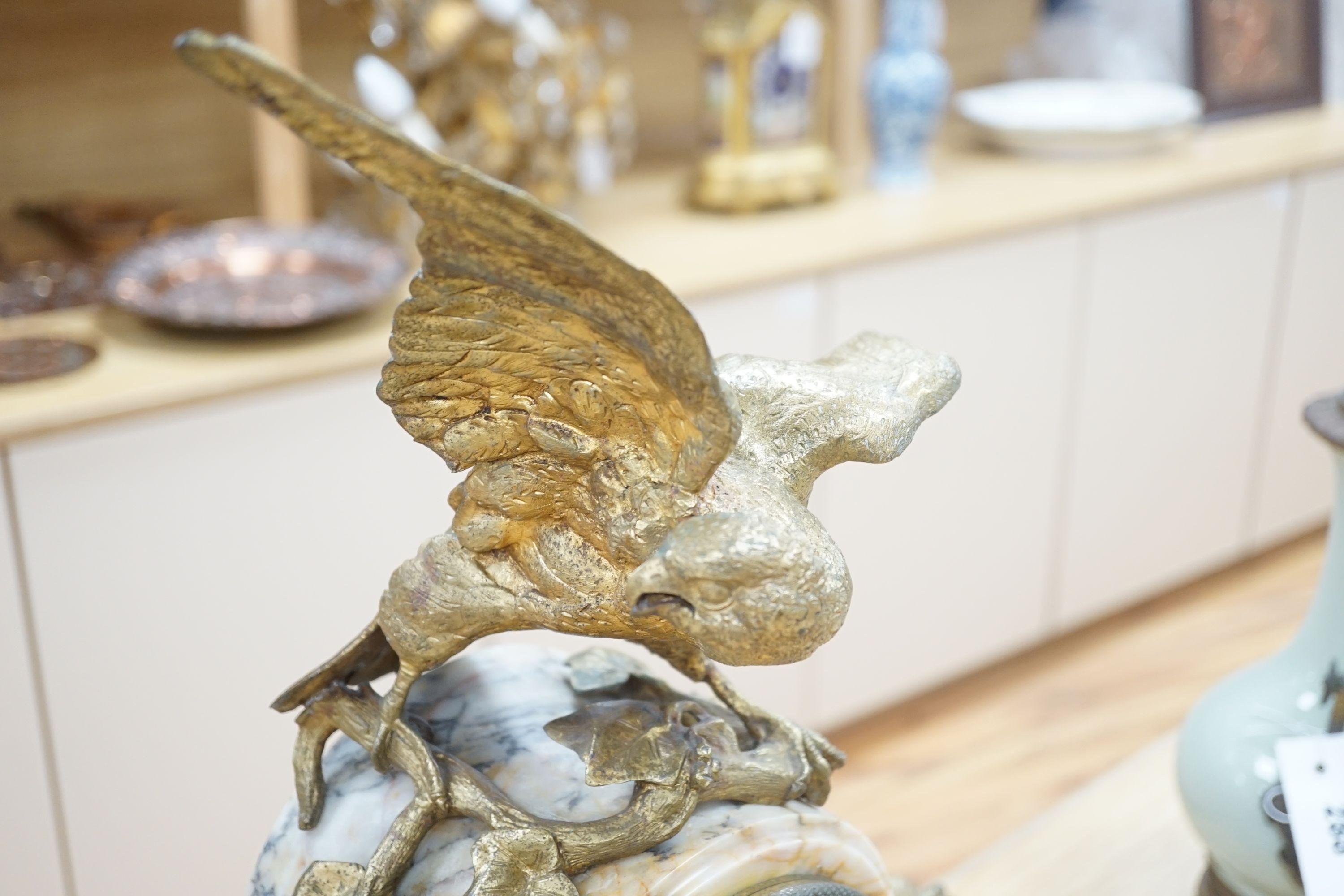 A late 19th century French marble clock garniture with bronze eagle, signed by J Moignier, height 51cm